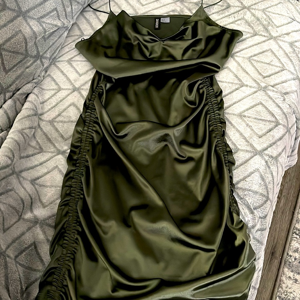 Divided size medium army green crumple strap dress.
